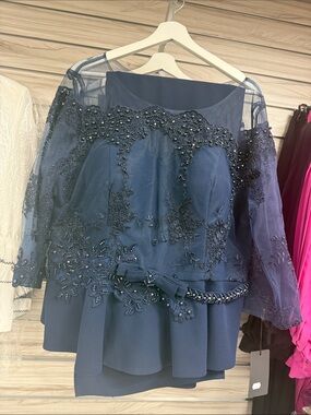 Embroidered Navy Peplum Top with Beaded Bow Trim